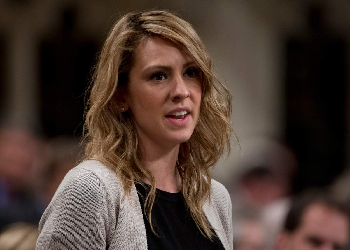 NDP MP Ruth Ellen Brosseau rises in the House of Commons in Ottawa, Tuesday October 16, 2012. THE CANADIAN PRESS IMAGES/Adrian Wyld.