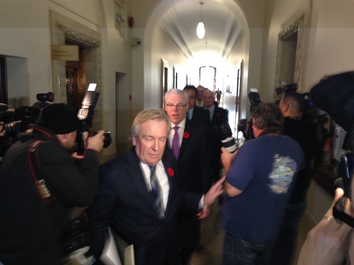 Manitoba Premier Greg Selinger (middle) on Monday, November 3, 2014.