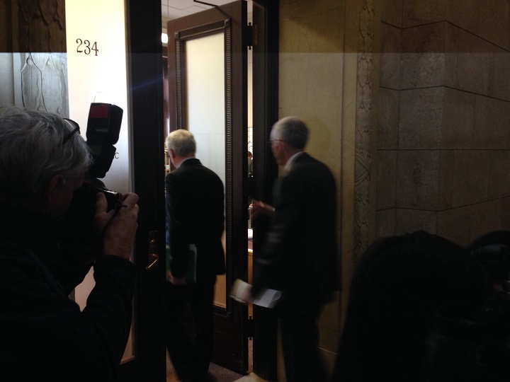 Manitoba Premier Greg Selinger goes into a meeting of the NDP caucus on Thursday, November 13, 2014.