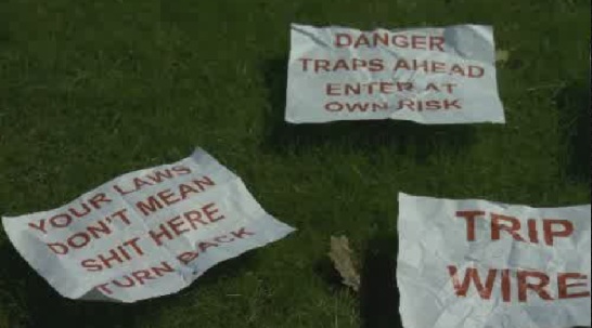 Burnaby Mountain residents concerned about unsettling signs found near protest camp - image
