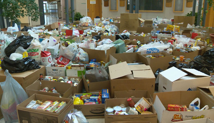St. Joseph High School students collected the largest haul in the history of their annual Halloween food drive, according to organizer.