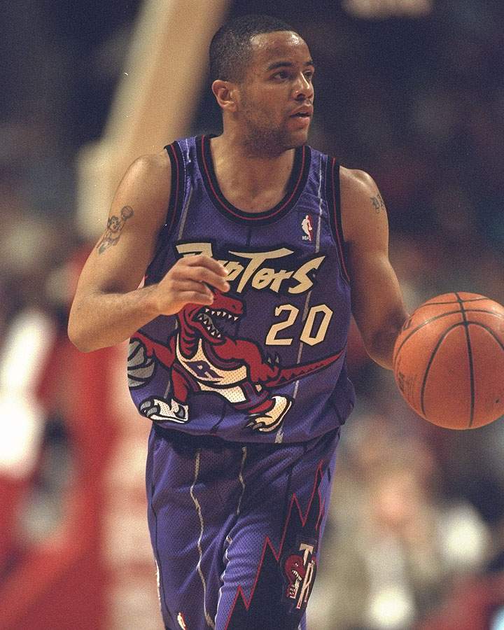 7 Nov 1995: Forward Damian Stoudamire #20 of the Toronto Raptors dribbles the ball down court against the Chicago Bulls at the United Center in Chicago, Illinois.