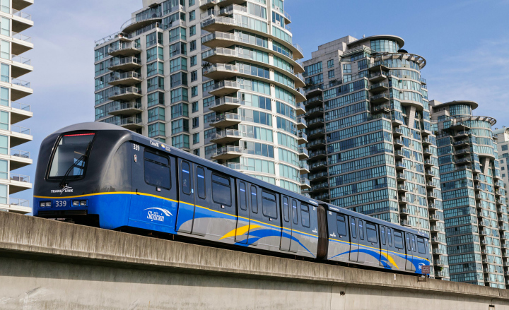 Photo of the SkyTrain travelling on the tracks in Vancouver, B.C.