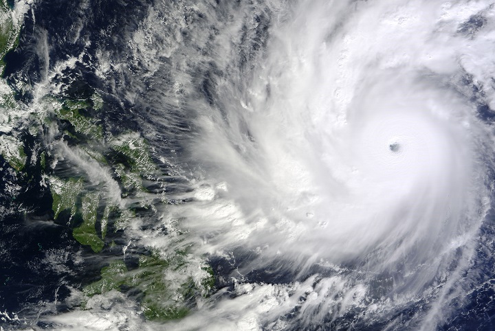 This image captured by the MODIS instrument aboard NASA's Terra satellite shows Typhoon Hagupit on Thursday, Dec. 4, 2014, at 02:10 UTC, as it approaches the Philippines. Villagers are fleeing coastal towns in the central Philippines as the advancing storm evokes memories of last year's deadly typhoon. Forecasters say Typhoon Hagupit may hit some of the same places devastated by Haiyan in 2013. 