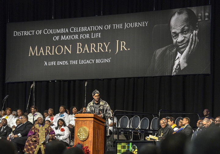 Christopher Barry, the son of District of Columbia Mayor Marion Barry, makes remarks during the final funeral service for his father at the Convention Center on Dec. 6, 2014 in Washington.