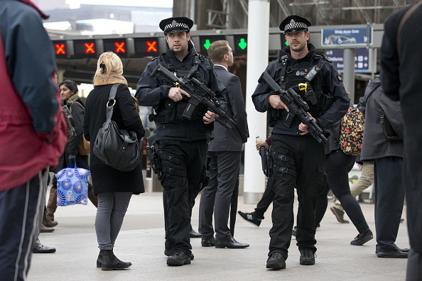 Armed officers from the British Transport Police patrol armed with automatic rifles and tasers as part of Counter Terrorism Awareness Week at London Bridge station in London on November 27, 2014.
