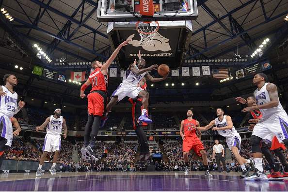 Darren Collison #7 of the Sacramento Kings takes the ball to the basket against the Toronto Raptors at Sleep Train Arena on December 2, 2014 in Sacramento, California. 