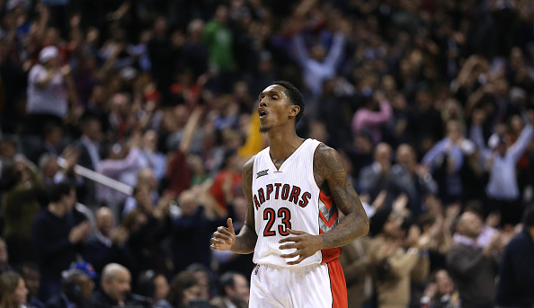 Louis Williams celebrates a deep three to seal the game as the Toronto Raptors beat the Denver Nuggets 112-107 in overtime at the Air Canada Centre in Toronto. December 8, 2014.