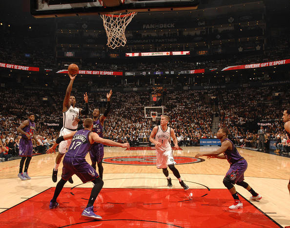  Joe Johnson #7 of the Brooklyn Nets shoots the ball against the Toronto Raptors during the game on December 17, 2014 at the Air Canada Centre in Toronto, Ontario, Canada.
