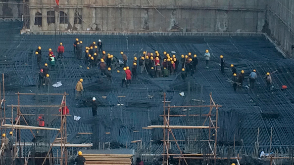 A construction scaffolding collapsed, kills 10 worker and hurts 4 people at Tsinghua University affiliated middle school on 29th December, 2014 in Beijing, China.