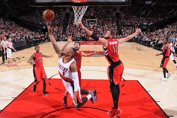 Damian Lillard #0 of the Portland Trail Blazers shoots the ball against the Toronto Raptors during the game on December 30, 2014 at the Moda Center in Portland, Oregon. 