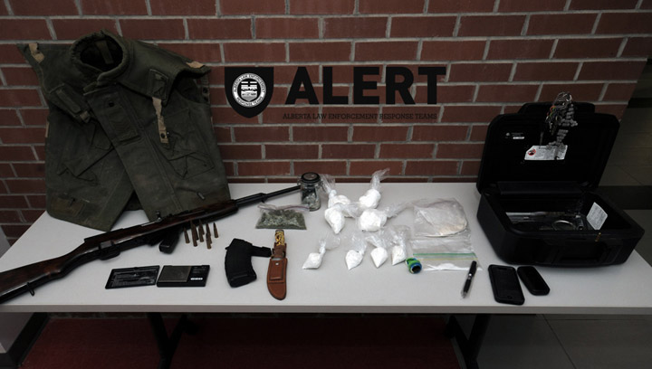 Police in Saskatchewan, Alberta make drug bust, seize $84,000 in cocaine, semi-automatic rifle, body armour.