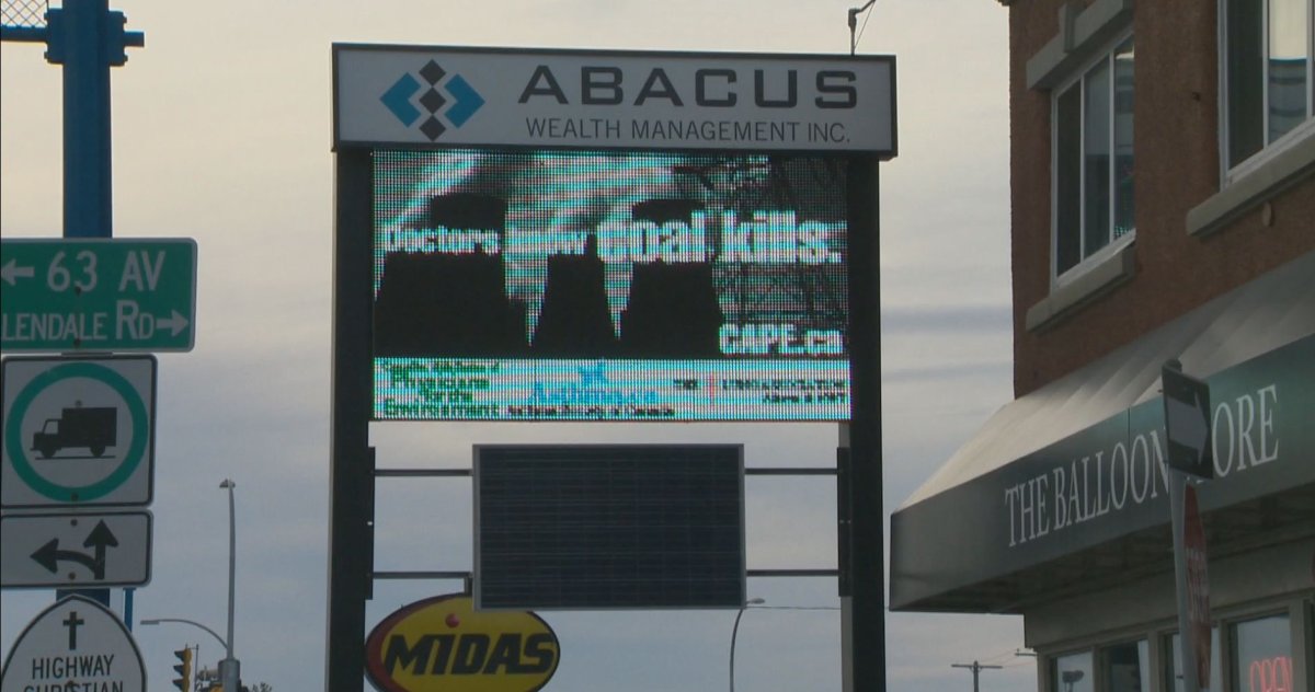 A solar-powered billboard in Edmonton, where an ad highlighting the dangers of coal-fired power is displayed. December 12, 2014.