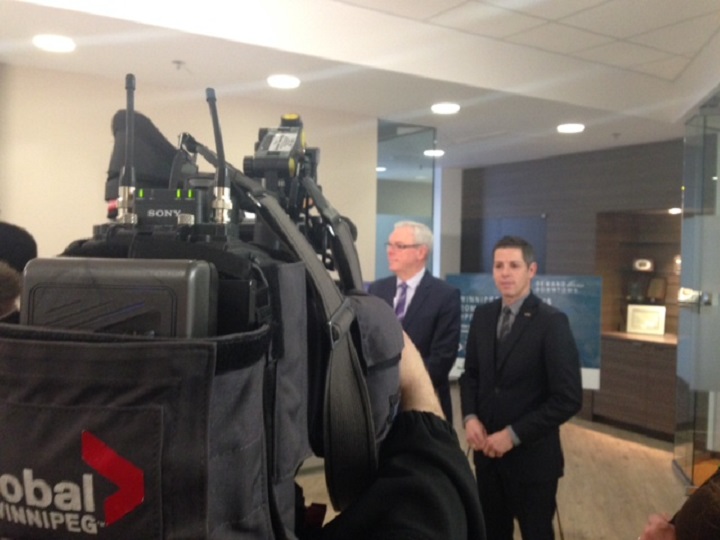 Winnipeg mayor Brian Bowman (right) with Manitoba premier Greg Selinger at an announcement Tuesday, December 2, 2014.