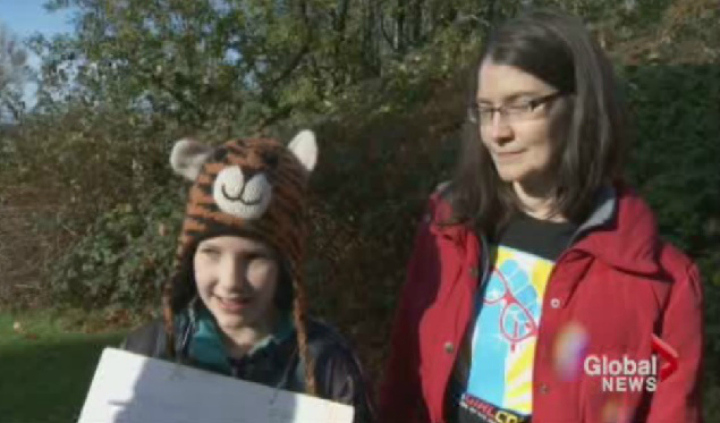 Kate Fink-Jensen, 11, and mother Kim were among the protesters at Burnaby Mountain on Nov. 23.
