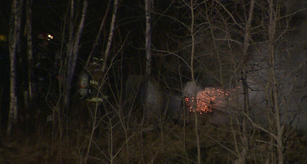Fire crews respond to an early-morning blaze in a wooded area of Burnside. (Dec. 17, 2014).