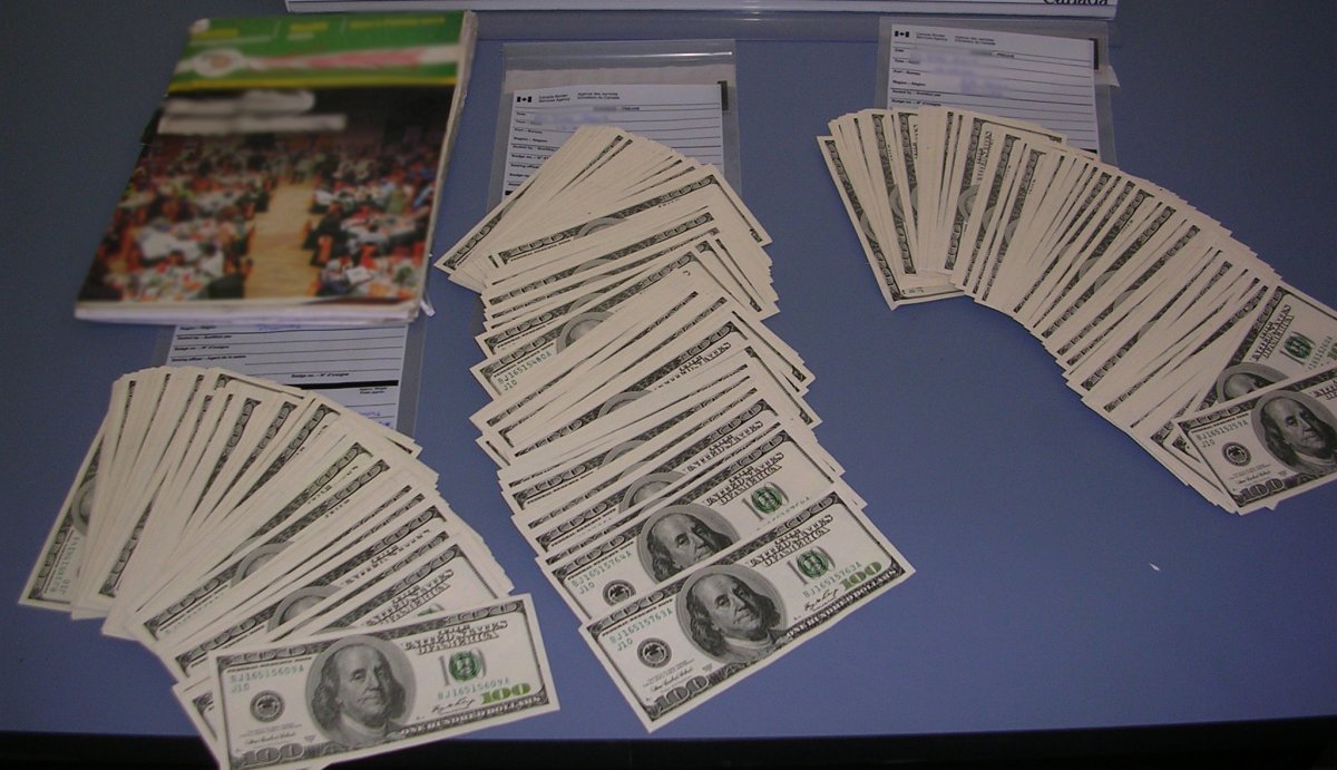 Picture of counterfeit U.S. $100 bills found hidden in a shipment at the Edmonton International Airport. December 11, 2014.