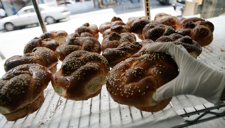 Challah buns sit on a shelf on the last day of business for Gertel's Bake Shop in New York City.
