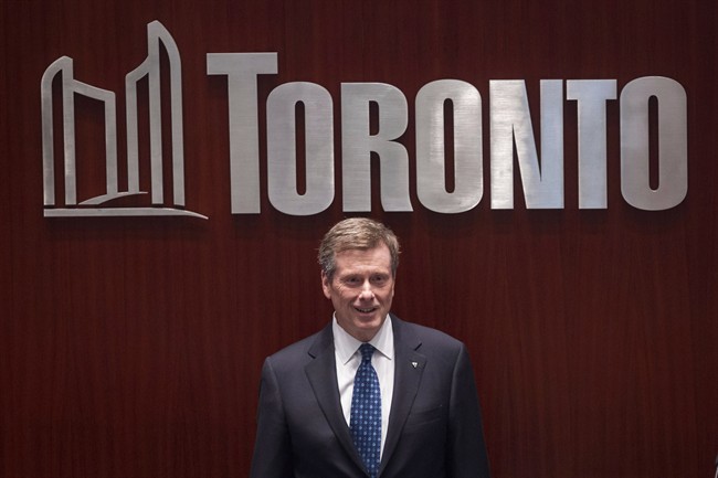 Toronto's new Mayor John Tory stands in the council chamber during an inauguration ceremony in Toronto on Tuesday, December 2, 2014.