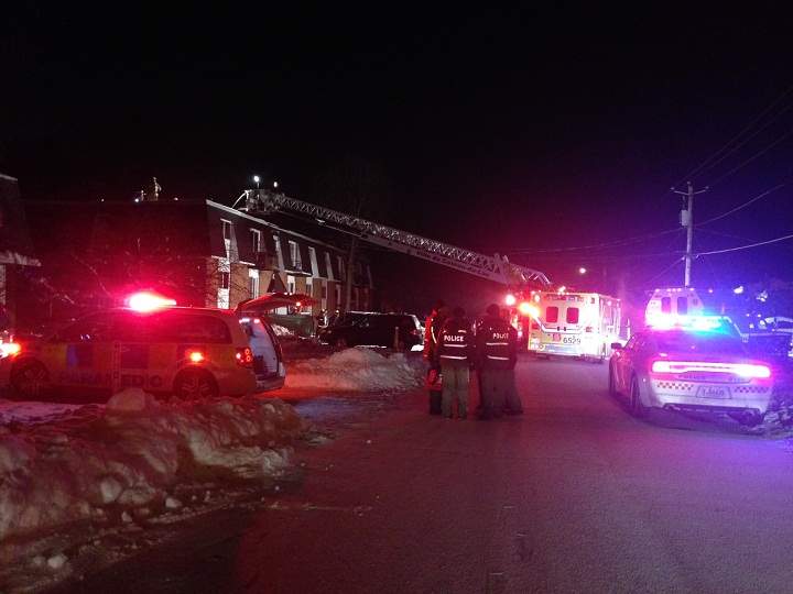 Quebec provincial police are investigating a fire in an apartment building in Les Coteaux, Que., which has left two dead and three injured on December 23, 2014.