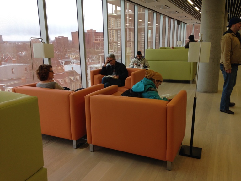 There are many comfy couches and seating areas inside the library.