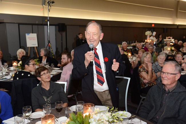 Doug Franklin, 86, is honoured at a banquet Nov. 5 for his 25 years of service as a "Green Coat" volunteer at Vancouver International Airport. 