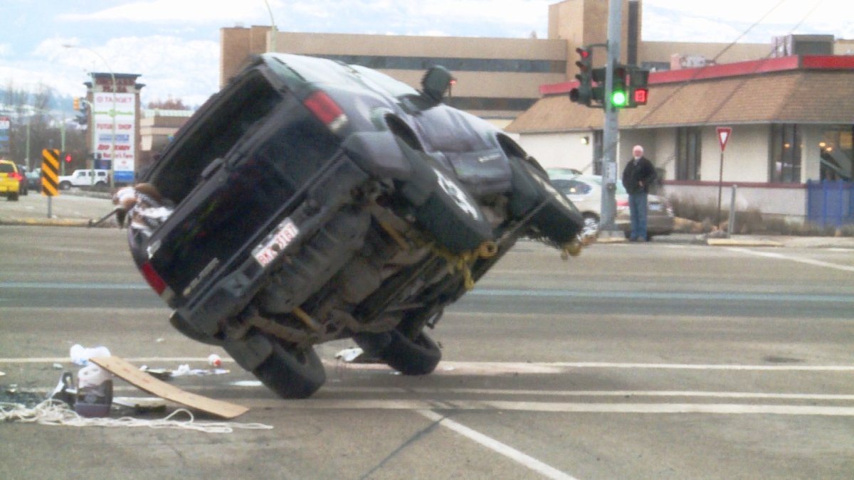 Kelowna crash sends SUV flipping - image