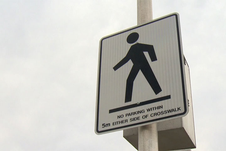 A file photo of a crosswalk sign.