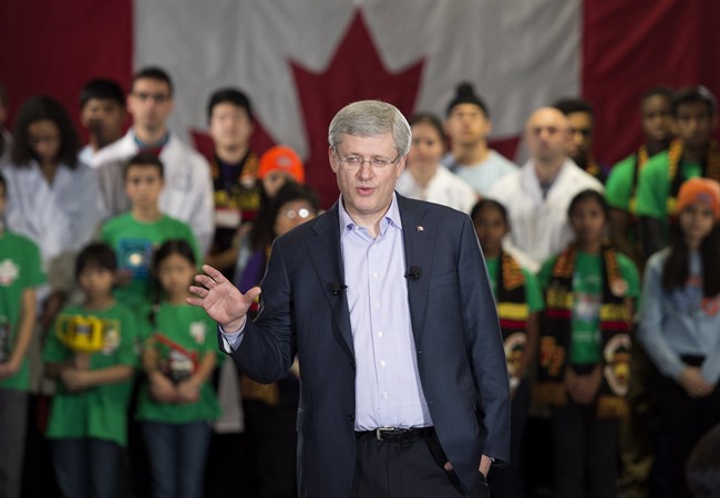 Prime Minister Stephen Harper makes an announcement at IBM Laboratories in Markham, Ont. on Thursday, December 4, 2014.