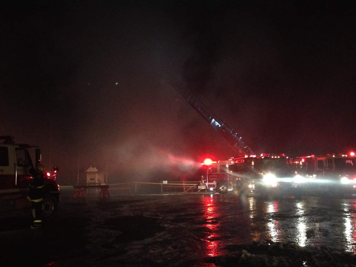 Mostly smoke remains at the scene where Poley Mountain's ski lodge went up in flames early Tuesday evening.