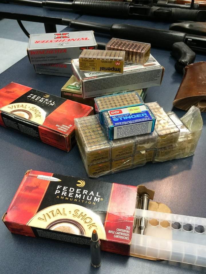 Police discovered a cache of weapons during a routine call to a home in the Daniel McIntyre area Wednesday night.