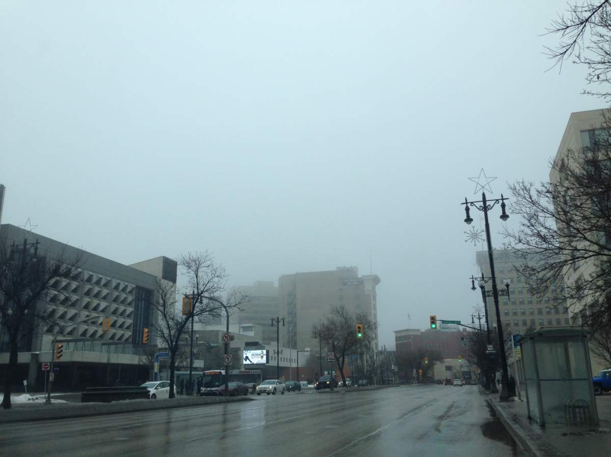 The above-seasonal temperatures and low-lying cloud made for foggy conditions in Winnipeg on December 13, 2014.