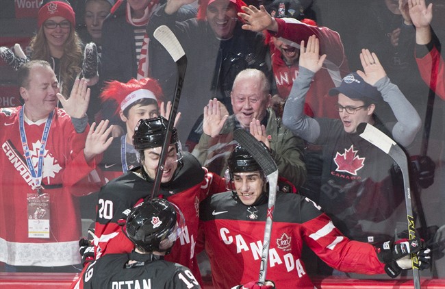 Canada's Robby Fabbri, right, celebrates after scoring against Slovakia during first period preliminary round hockey action at the IIHF World Junior Championship in Montreal on Friday, December 26, 2014.