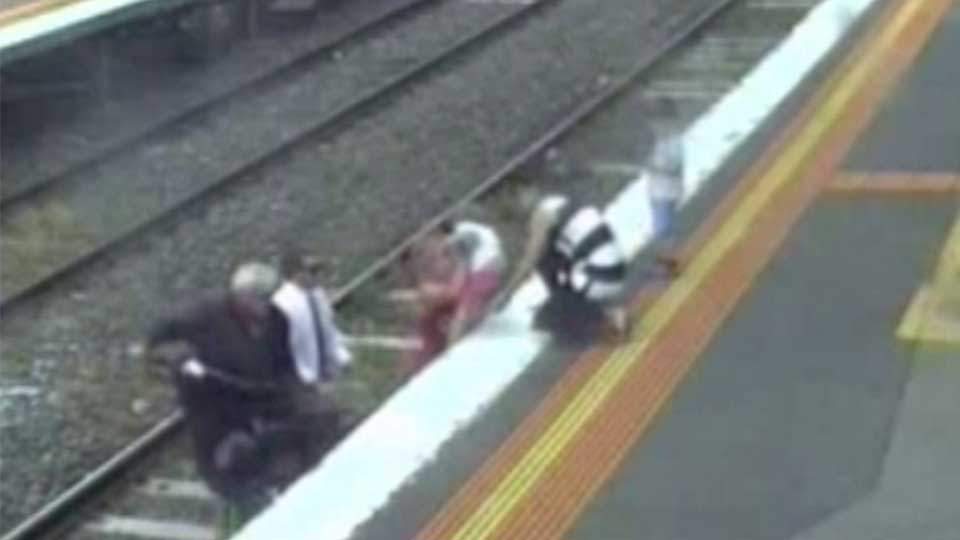 Toddler rescued from train tracks