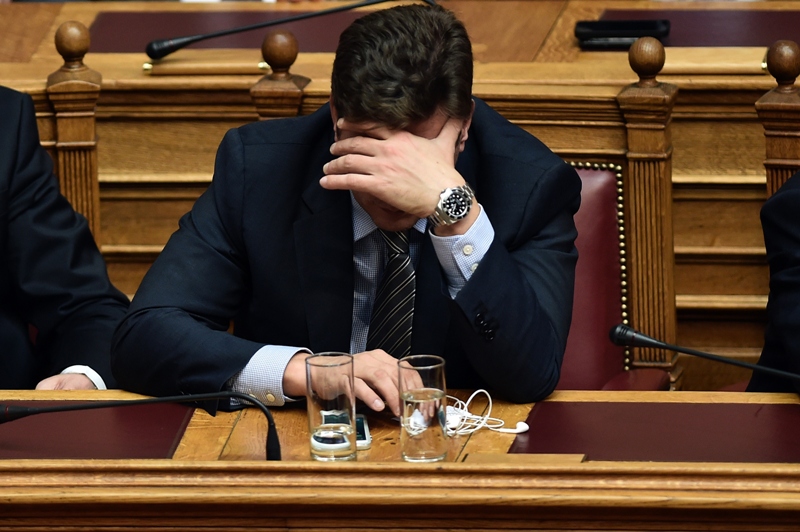 Greek Minister of Shipping Miltiadis Varvitsiotis is pictured in parliament during a high-stakes vote to elect Greek president, in Athens on December 29, 2014. 