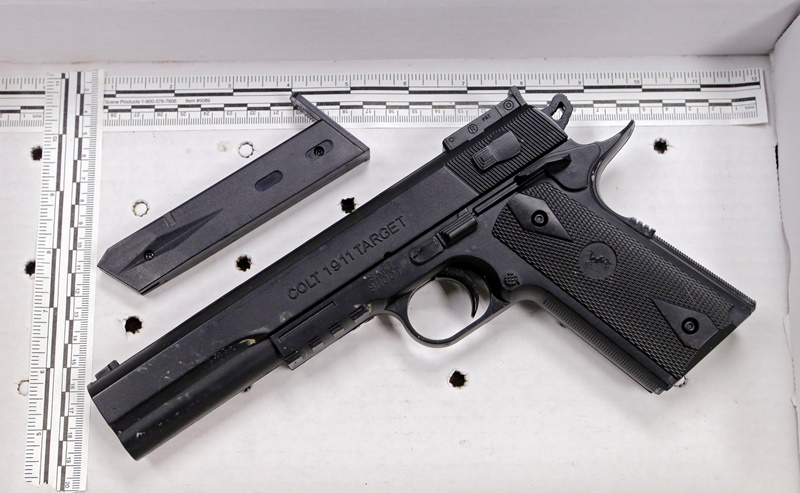 In a Wednesday, Nov. 26, 2014 file photo, a fake handgun taken from 12-year-old Tamir Rice, who was fatally shot by Cleveland police, is displayed after a news conference in Cleveland. The 12-year-old was shot at a city park after he reportedly pulled the Colt 1911 replica on arriving officers. Two fatal police shootings in less than four months of young people holding lookalike guns in Ohio have raised calls for action to prevent such tragedies. 