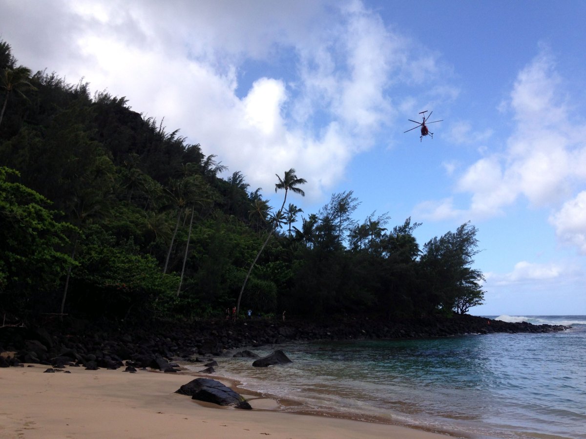 A Kauai County Fire Department helicopter is shown above rescuing hikers in April 2014.