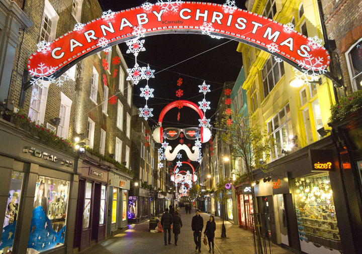 Christmas lights decorate Carnaby street in central London on December 7, 2014.
