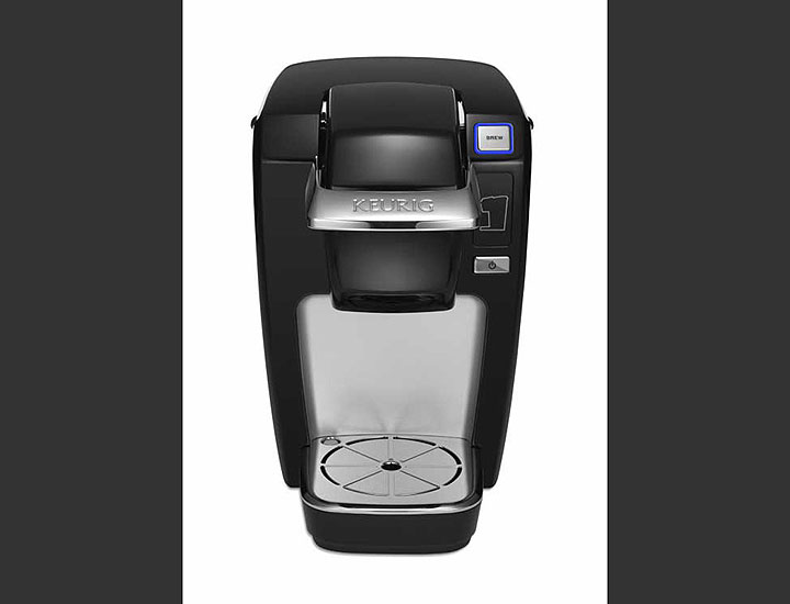This undated product image from Keurig and released by the Consumer Product Safety Commission shows the Keurig Mini Plus coffee brewer. Keurig is recalling more than 7 million of the single-serve coffee brewing machines after reports that a number of them had spewed hot liquids and injured dozens of users, the company said Tuesday, Dec. 23, 2014.