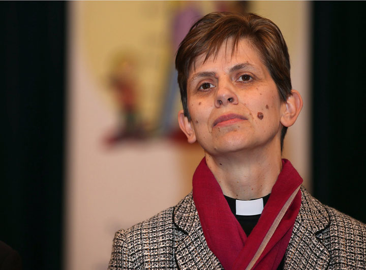 Libby Lane pauses as she delivers a speech in the Stockport Town Hall,  after the announcement by the Church of England that she will be appointed as the first female bishop, in Stockport, England, Wednesday Dec. 17, 2014. 