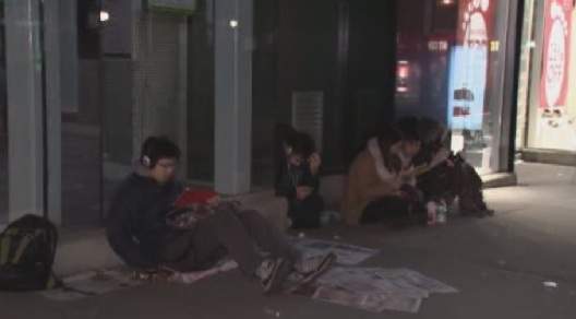 Shoppers outside Future Shop in downtown Vancouver.