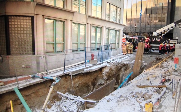 Construction worker rescued after falling into hole in Old Montreal ...