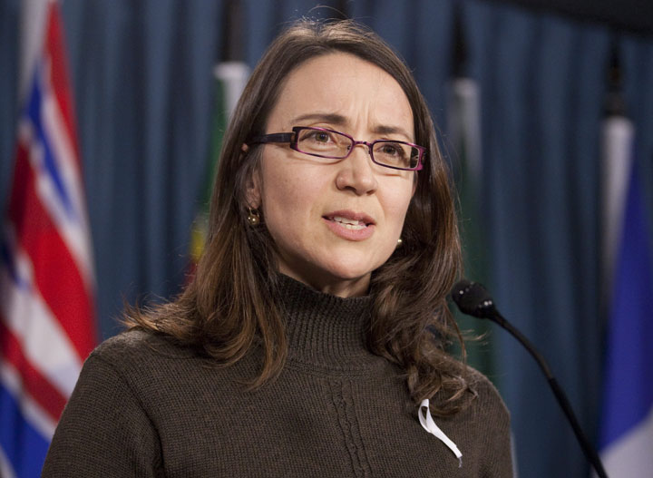 Nathalie Provost, a victim of the 1989 shooting at Ecole Polytechnique in Montreal, speaks about gun control during a news conference on Parliament Hill in Ottawa, Thursday November 24, 2011. 