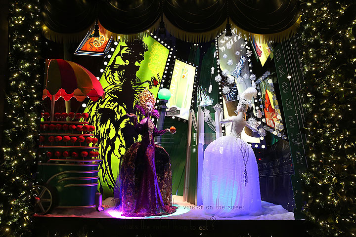This Nov. 24, 2014 photo provided by Saks Fifth Avenue shows one of the holiday windows at the retailer’s flagship store in New York City. Saks’ window displays this season are themed on classic fairytales but are decorated in Art Deco style.