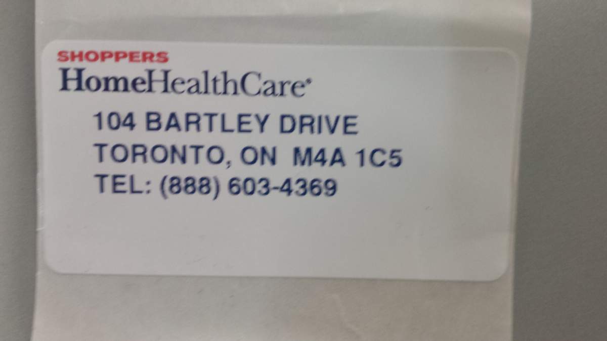 Sticker identifying the drugstore from which the ramp was leased.