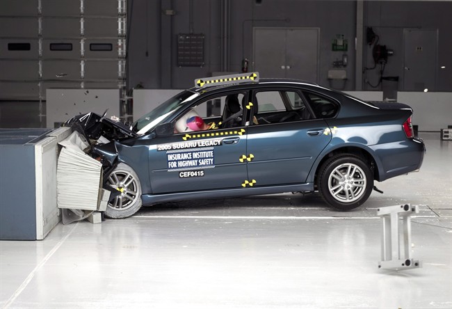 This undated photo provided by the Insurance Institute for Highway Safety shows the frontal offset crash test of the 2005 Subaru Legacy. 
