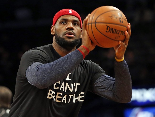 Cleveland Cavaliers forward LeBron James warms up before an NBA game. Professional athletes have worn "I Can't Breathe" messages in protest of a grand jury ruling not to indict an officer in the death of a New York man. (AP Photo/Kathy Willens).