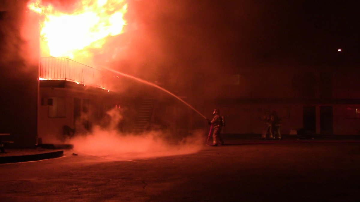 Penticton firefighters battle a blaze at the Pass Motor Inn on Skaha Lake Road Tuesday night. 