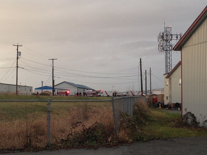 Ambulance and rescue crews on the scene of a small plane that crash-landed at the Pitt Meadows airport on Dec. 9, 2014.