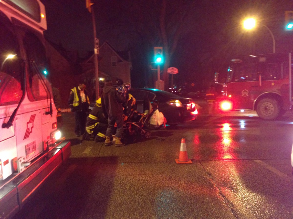 A woman was rushed to hospital in unstable condition Friday night after she was hit by a vehicle while crossing Osborne Street.